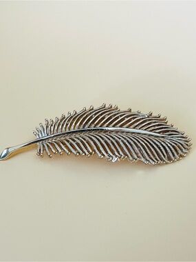 Large Gold tone feather brooch